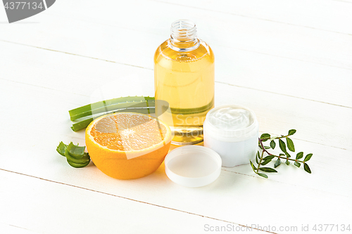 Image of Spa concept with salt, mint, lotion, towel on white background