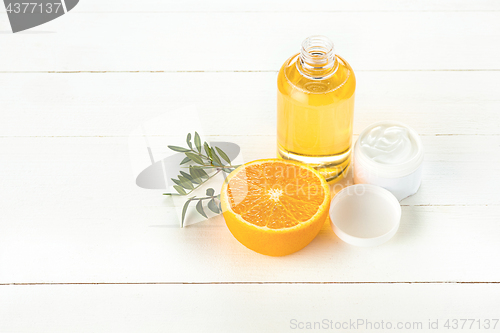 Image of Spa concept with salt, mint, lotion, towel on white background