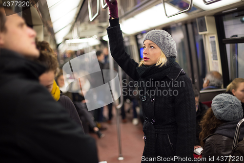 Image of Woman on subway.