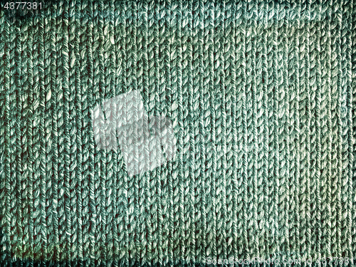 Image of Grungy faded green knitted background