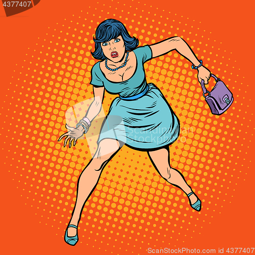 Image of Beautiful woman with a bag running