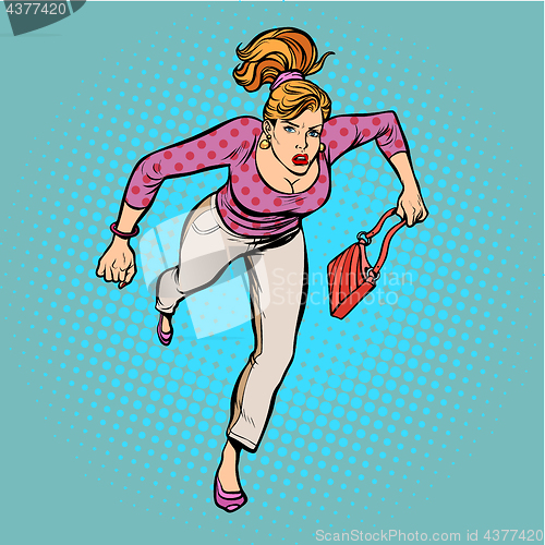 Image of Beautiful woman with a bag running