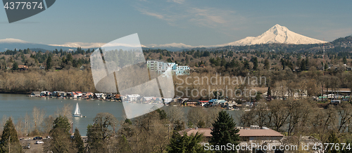 Image of Boats on Willamette River Below Mount Hood Oregon North America