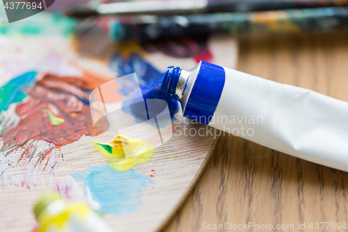 Image of acrylic color or paint tubes and palette