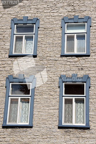 Image of Wooden windows over an old building in Quebec