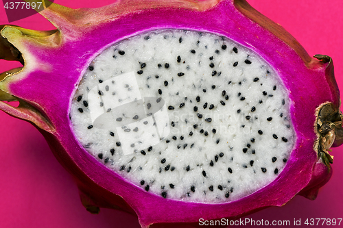 Image of A longitudinal section of a ripe dragon fruit