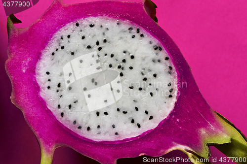 Image of A longitudinal section of a ripe dragon fruit