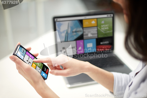 Image of close up of woman with smartphone at office