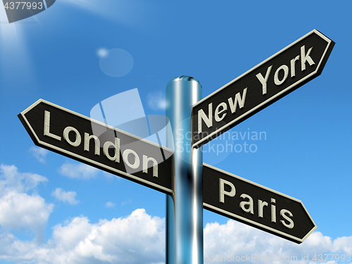 Image of London Paris New York Signpost Showing Travel Tourism And Destin