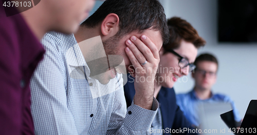 Image of Business Team At A Meeting at modern office building