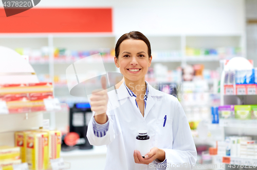 Image of apothecary with drug showing thumbs up at pharmacy