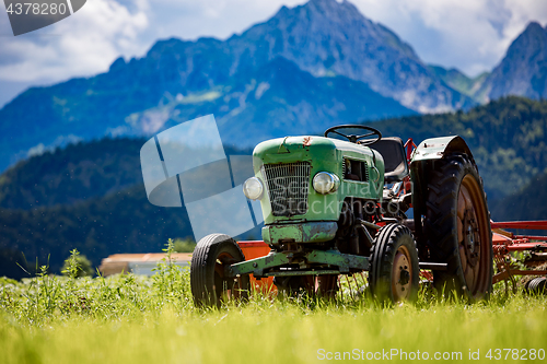 Image of Old tractor in the Alpine meadows