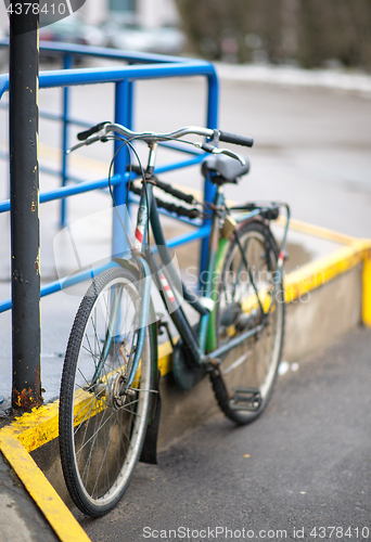 Image of wet bicycle in the rain