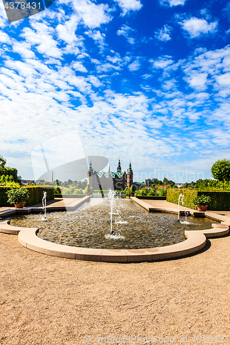 Image of A fountain in the beautiful parkland around the great castle Fre