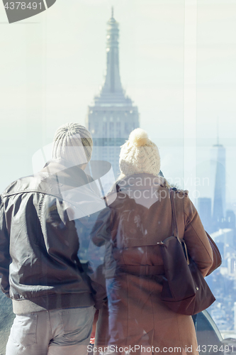 Image of Tourist taking photo of New York City.