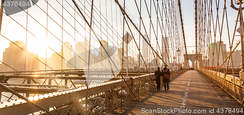 Image of Brooklyn bridge at sunset, New York City.