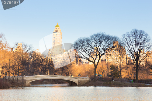 Image of New York City Manhattan Central Park panorama of The lake with Bow bridge.