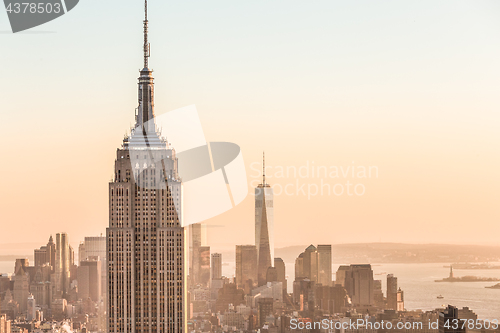 Image of New York City skyline with urban skyscrapers at sunset, USA.