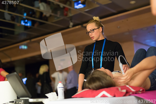 Image of Medical examination of patient with ultra sound scanner machine