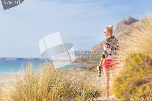 Image of Free Happy Woman Enjoying Sun on Vacations.