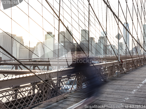 Image of Brooklyn bridge at sunset, New York City.