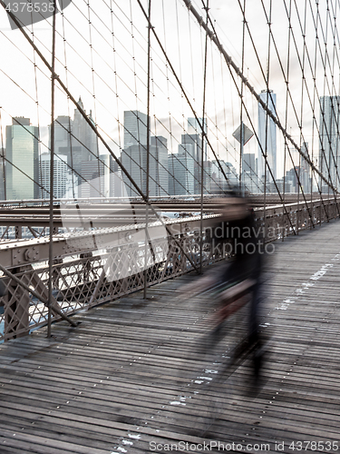 Image of Brooklyn bridge at sunset, New York City.