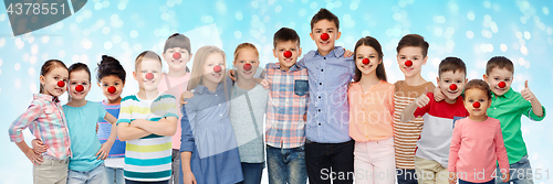 Image of happy children hugging at red nose day
