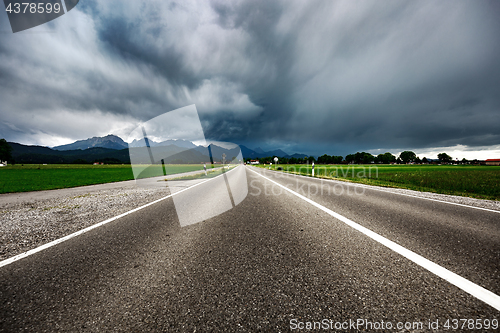 Image of Road leading into a storm - Forggensee and Schwangau, Germany Ba