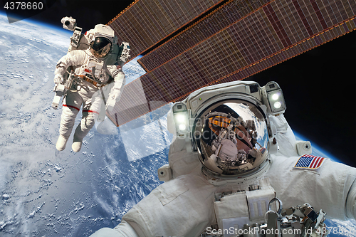 Image of International Space Station and astronaut.