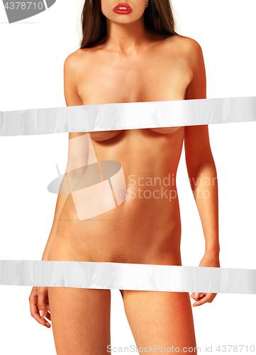 Image of beautiful nude woman with white tape