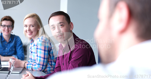 Image of Business Team At A Meeting at modern office building