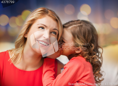 Image of happy mother and girl whispering into ear