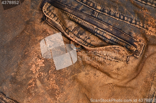 Image of Trousers with mud