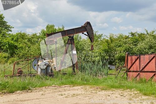 Image of Oil well on a landscape