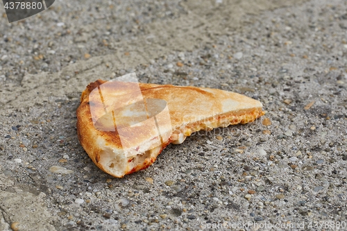 Image of Pizza slice on a plate