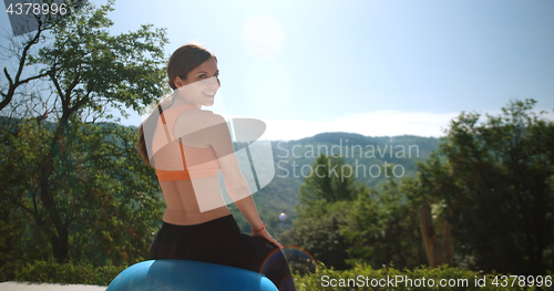 Image of Woman Doing Yoga at villa\'s terase