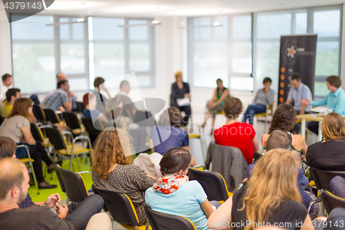 Image of Round table discussion at business and entrepreneurship convention.