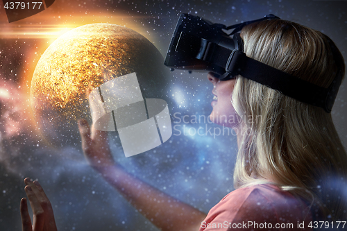 Image of woman in virtual reality headset or 3d glasses