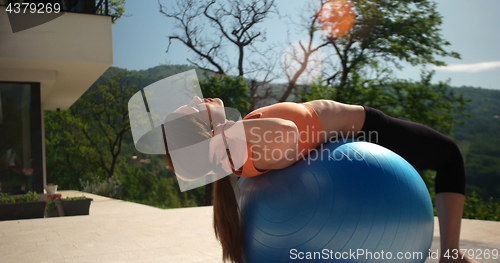 Image of Woman Doing Yoga at villa\'s terase