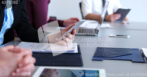 Image of office and teamwork concept - group of business people having a 