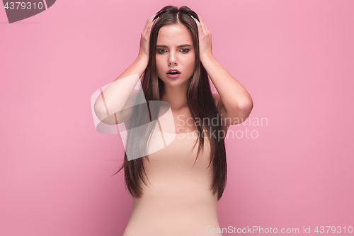 Image of The young woman\'s portrait with sad emotions