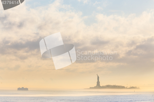 Image of Staten Island Ferry and Statue of Liberty.