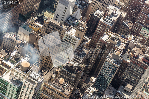 Image of New York City, Midtown Manhattan building rooftops. USA.