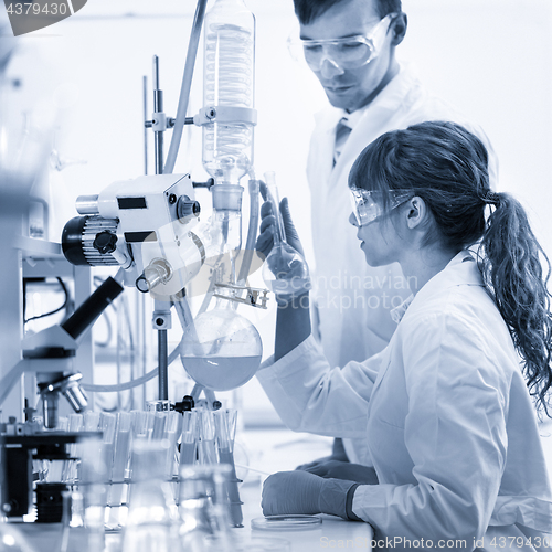 Image of Young chemists researching in life science laboratory.