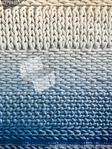 Image of White and blue winter knitted background