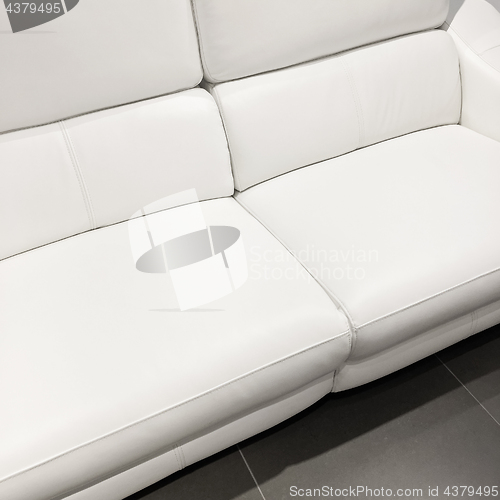 Image of Beautiful classy white sofa