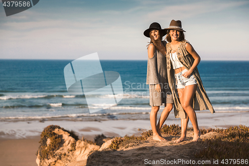 Image of Beautiful girls near the coastline