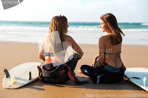 Image of Surfer girls at the beach 