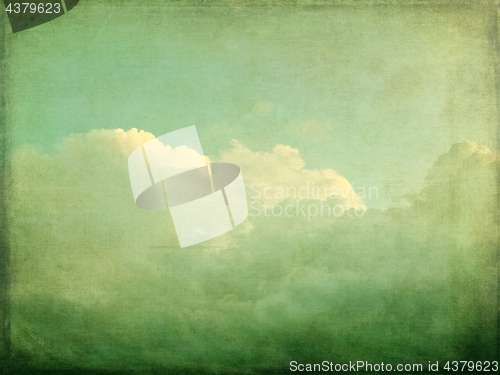 Image of Green vintage sky and clouds background
