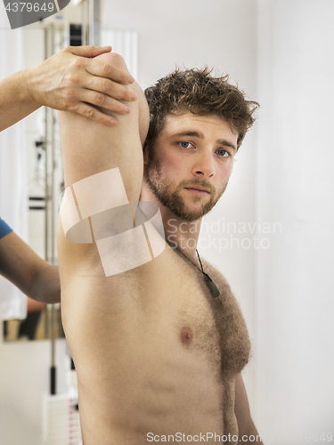 Image of young man at the physio therapy